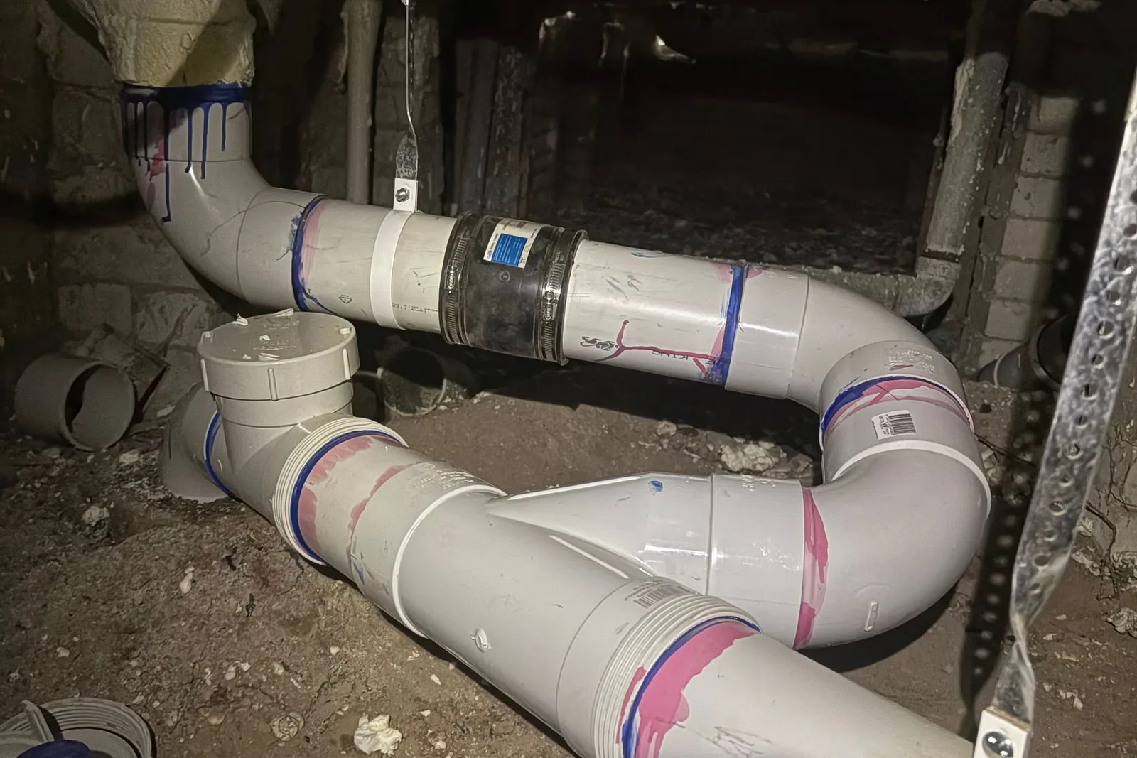Drainage repair in a subfloor during an urgent plumbing callout