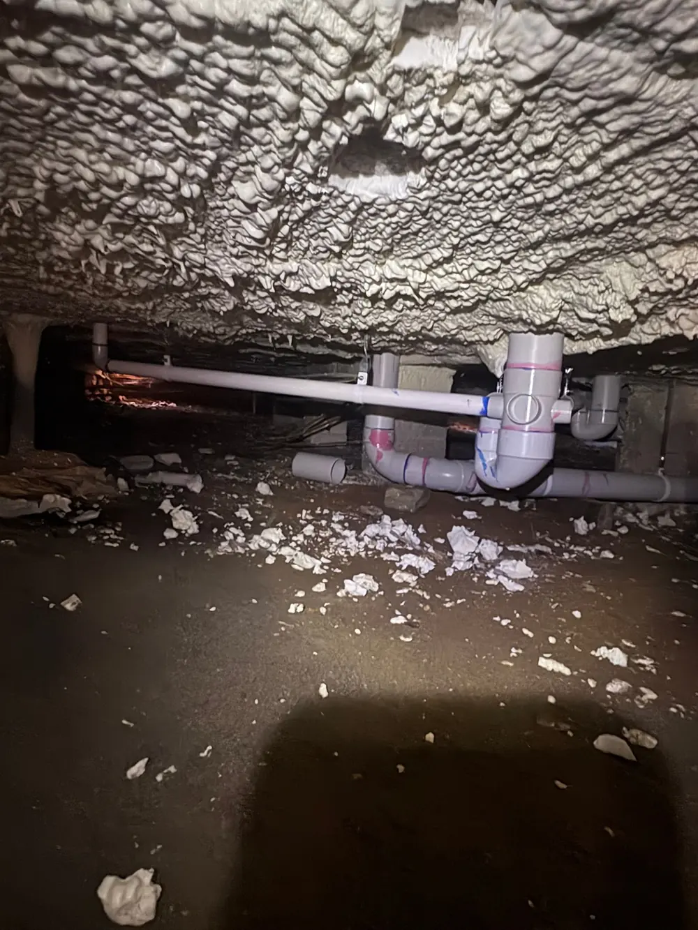 Drainage pipework repair beneath a building